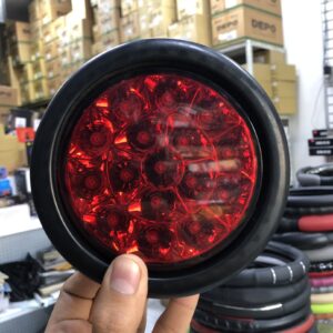 FARO POSTERIOR LED 12-24V CON FUNCION FIJA E INTERMITENTE CON BASE JEBE NEGRO
