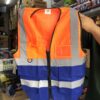 CHALECO REFLECTIVO DE SEGURIDAD VIAL O MINERA EN DISEÑO VARIADO COLOR NARANJA O NARANJA CON AZUL