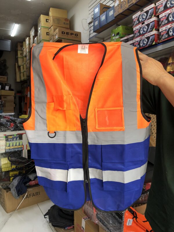 CHALECO REFLECTIVO DE SEGURIDAD VIAL O MINERA EN DISEÑO VARIADO COLOR NARANJA O NARANJA CON AZUL
